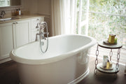 view of an empty white oval bath tub elegantly positioned in modern bathroom