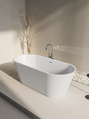 Glossy white 18263 freestanding bath tub displayed with clean, ambient lighting, affordable bath tub in Malaysia.