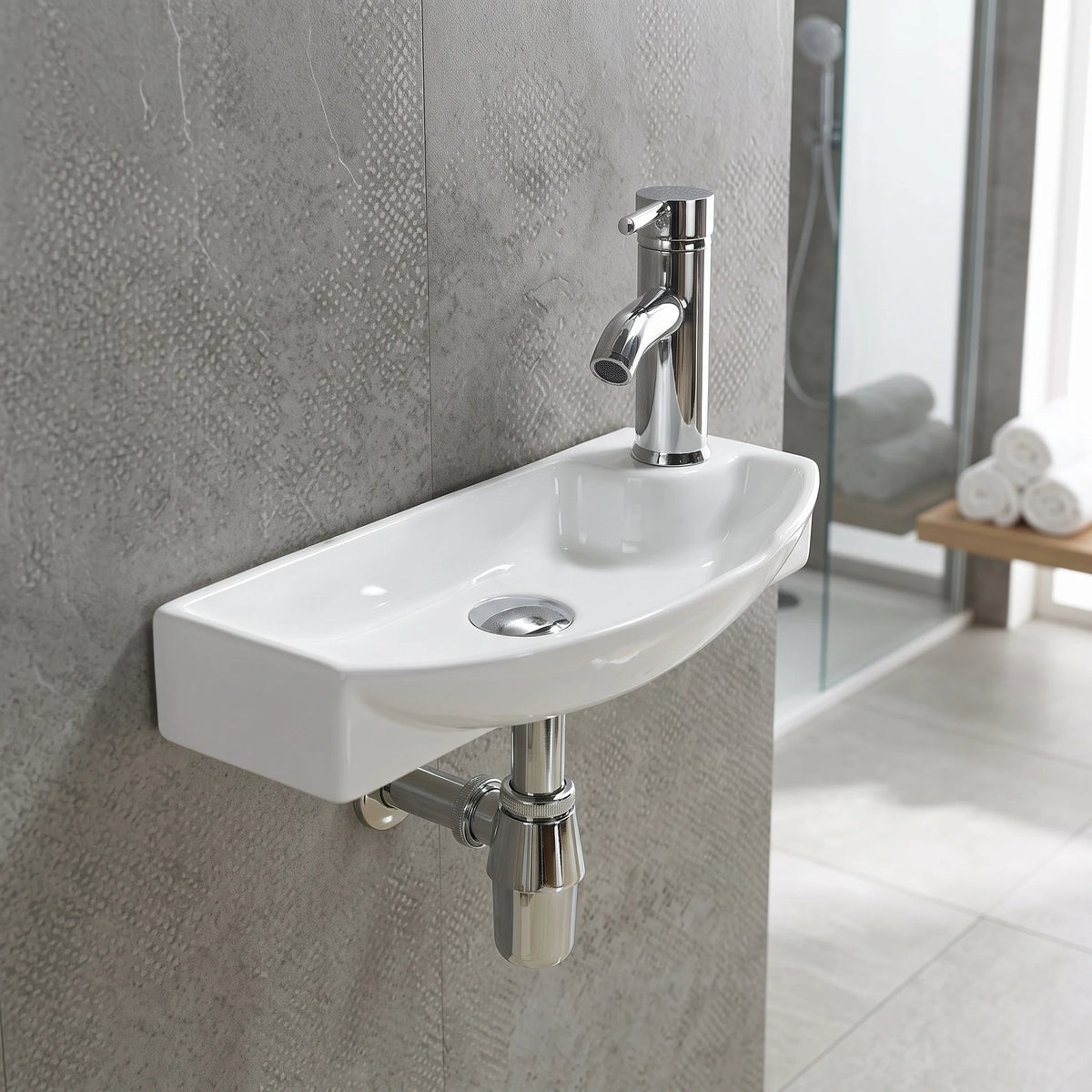 TREVI Wall Hung Wash Basin c/w Fixing Bolts - White in a room setting