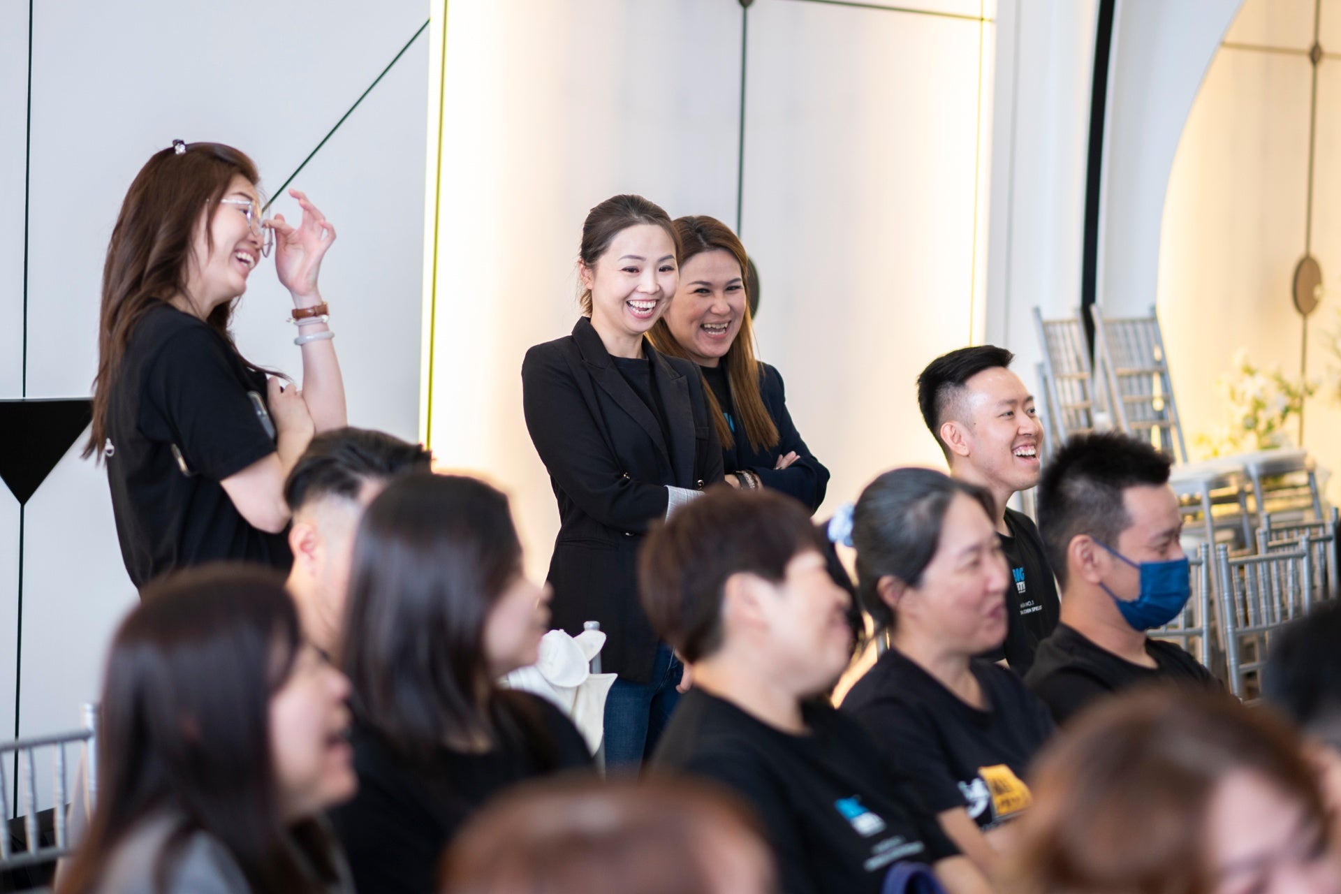 Team members laughing together