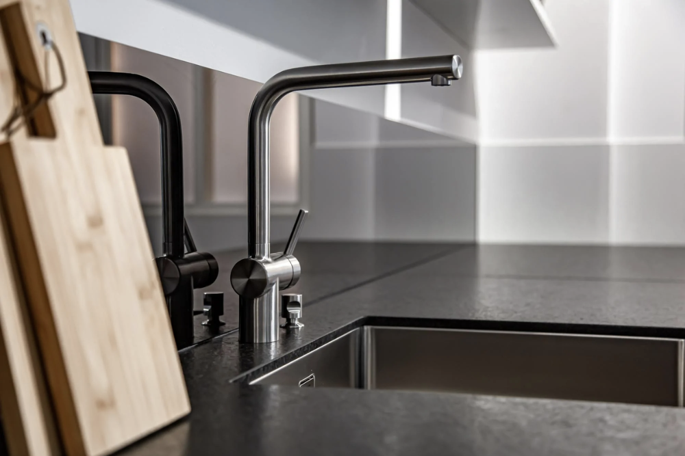 Granite composite sink installed in a contemporary kitchen countertop