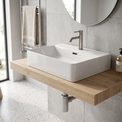 Rectangular Above Counter/ Wall Hung Wash Basin c/w Fixing Bolts - White in a room setting