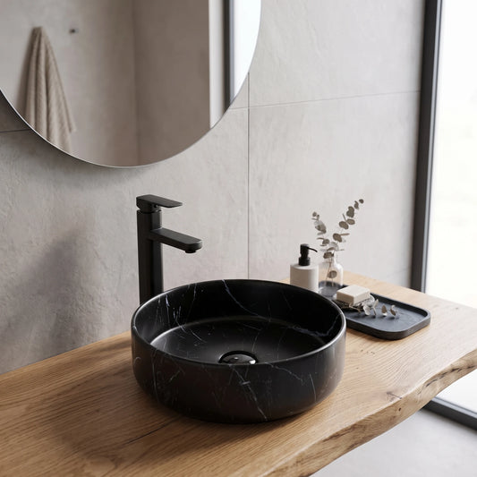 Round Above Counter Wash Basin c/w Waste - Marble Black in a room setting