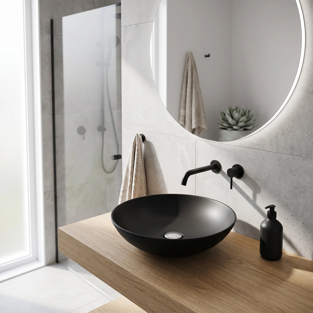Round Above Counter Wash Basin - Matt Black in a room setting