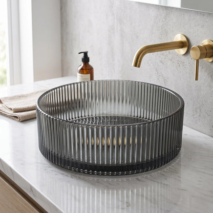 Round Glass Vessel Sink - Transparent Black in a room setting