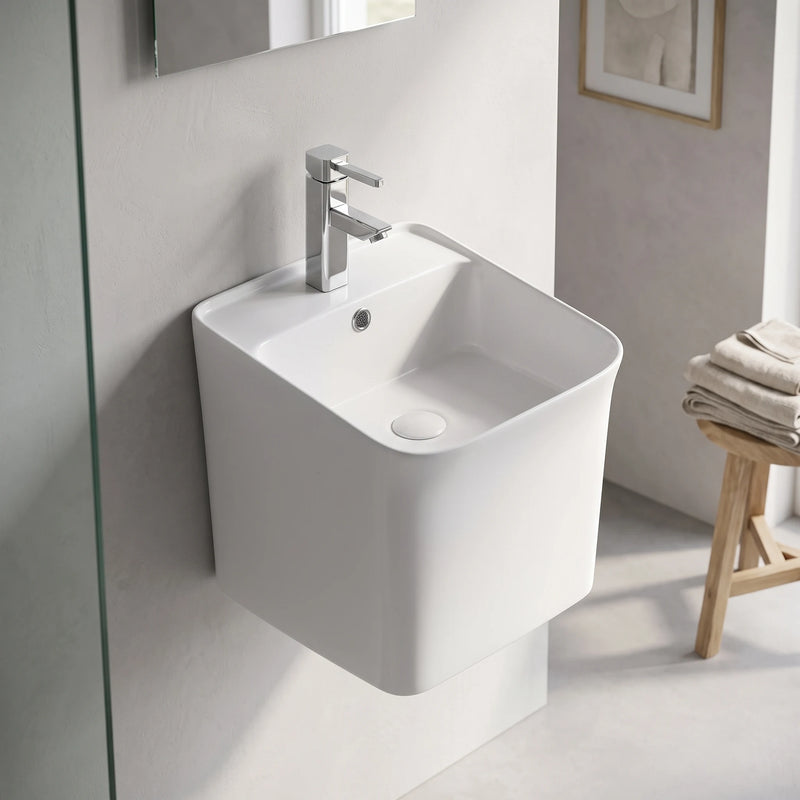 Wall Hung Wash Basin c/w Fixing Bolts - White in a room setting