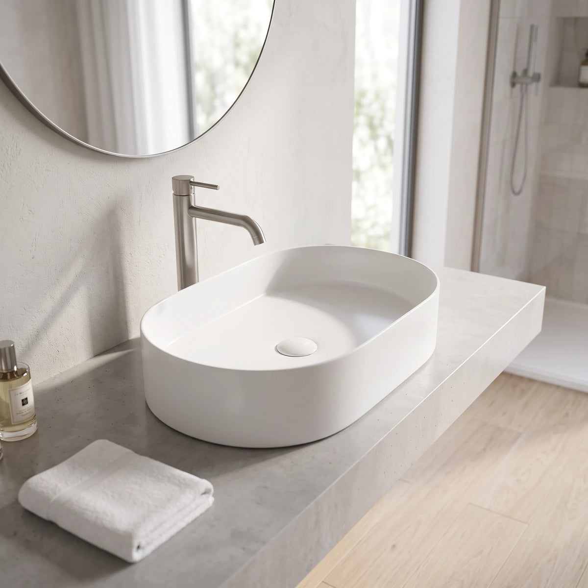 Oval Above Counter Wash Basin - White in a room setting