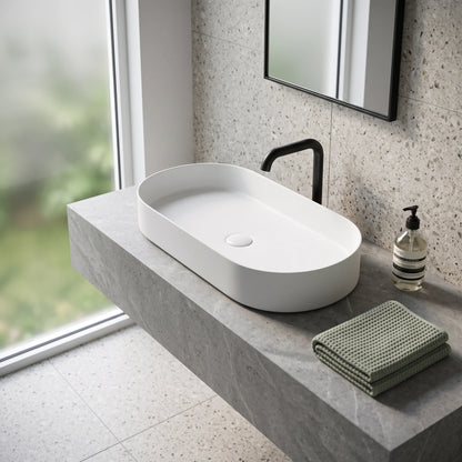 Oval Above Counter Wash Basin - White in a room setting