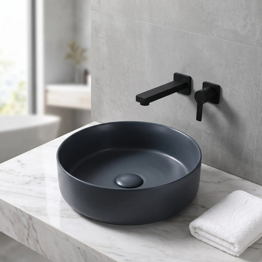 Round Above Counter Wash Basin with Waste - Matt Black in a room setting