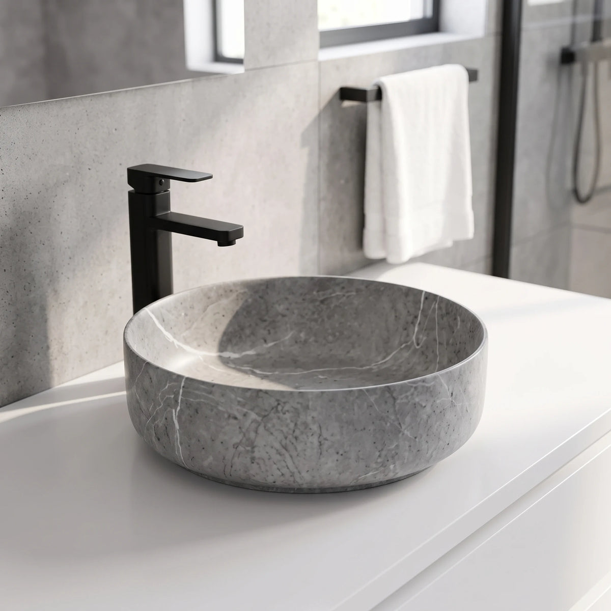 Round Above Counter Wash Basin c/w Waste - Marble Grey in a room setting