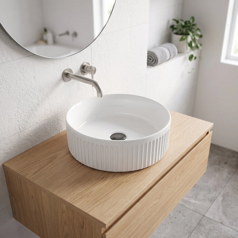 Round Above Counter Top Basin with Vertical Grooves - White in a room setting