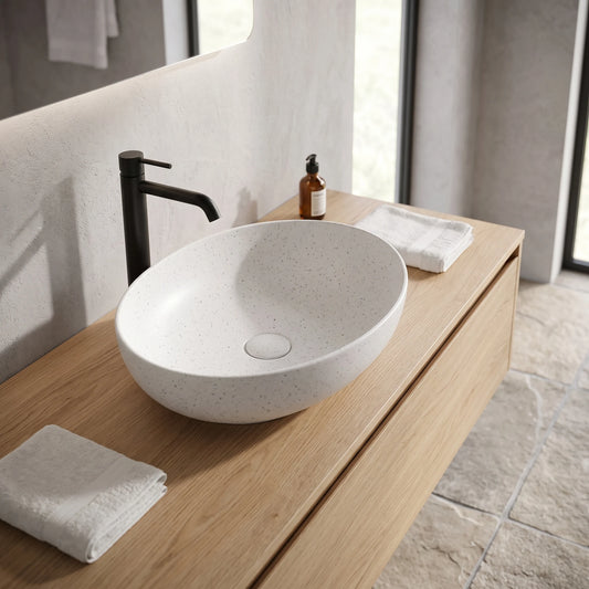 Oval Above Counter Wash Basin c/w Waste - White With Spot Pattern in a room setting