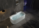White rectangular freestanding white tub with curved design and a narrow rim for modern and minimalist